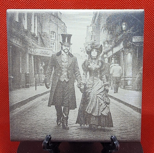 Steampunk Couple walking a cobbled street Laser engraved coaster/tile